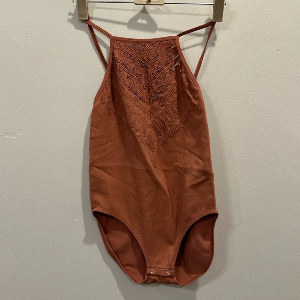 Free People body suit. Mauve pink. Size M/L. NWOT